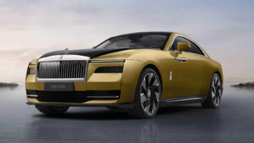 A gold and black two-tone Rolls-Royce Spectre